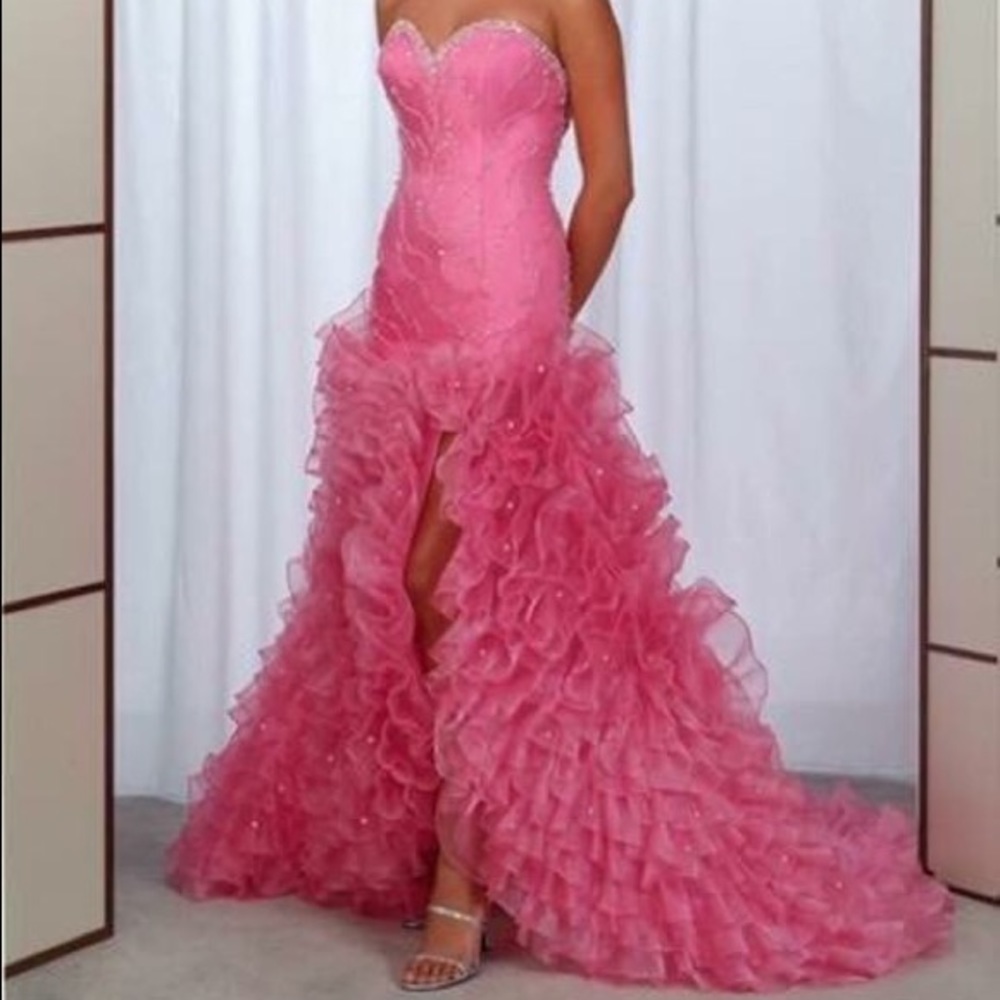 A bubblegum pink gown with diamond crystal design